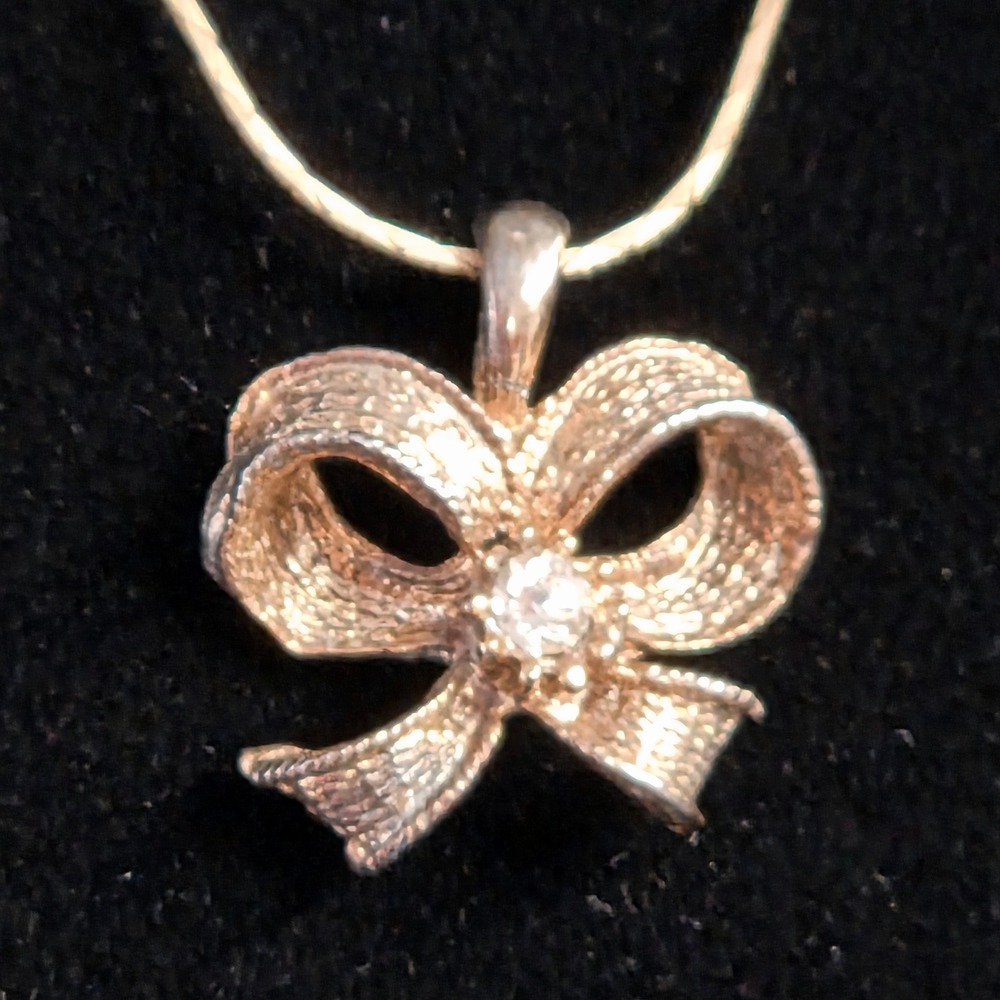 Gold Tone Bow Pendant Necklace Sparkling Cubic Zirconia Stone Delicate Chain